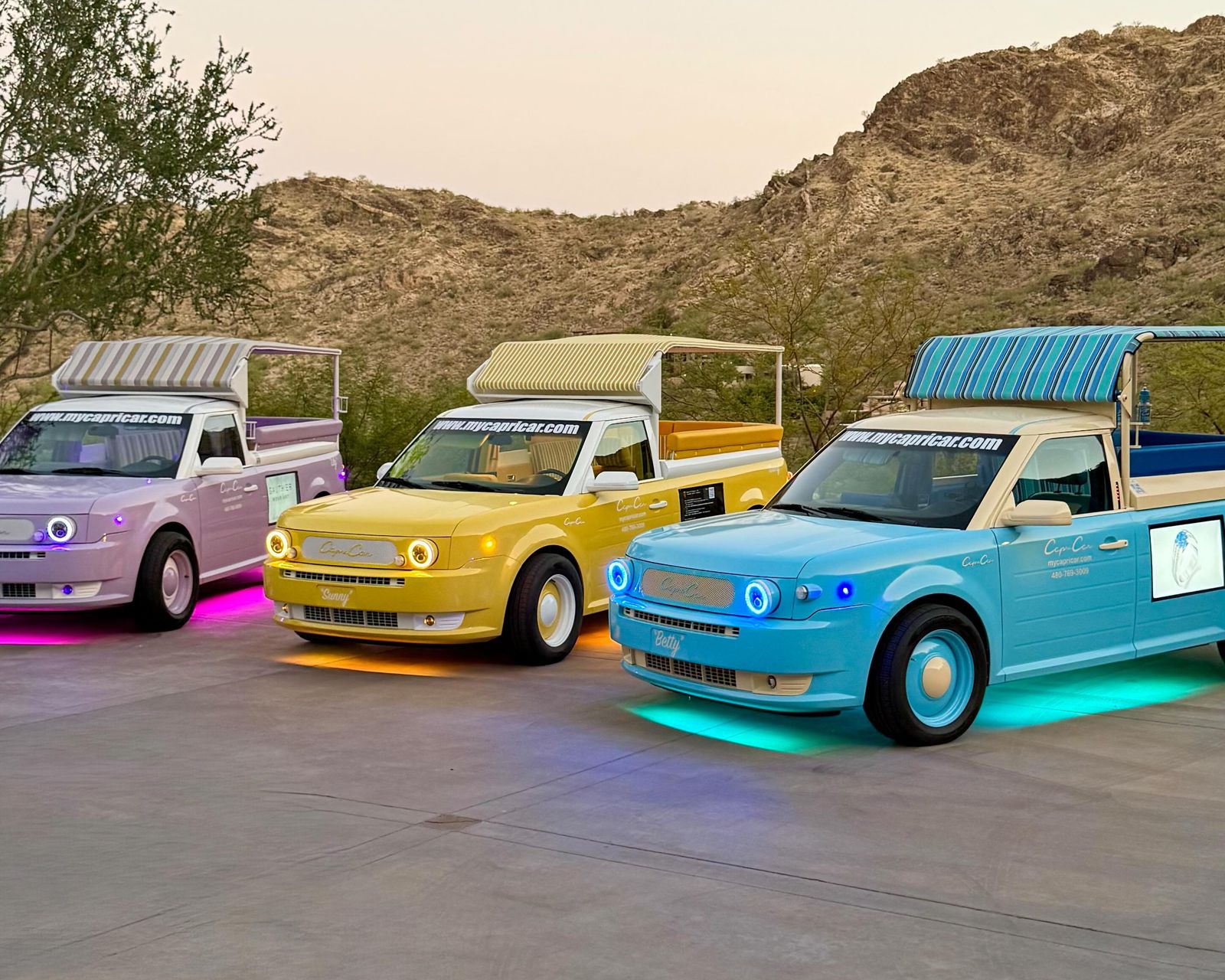 Three Capri Cars lined up beneath the Scottsdale foothills